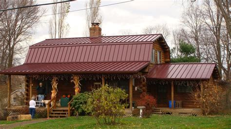 red house with brown metal roof|rustic red metal roofing.